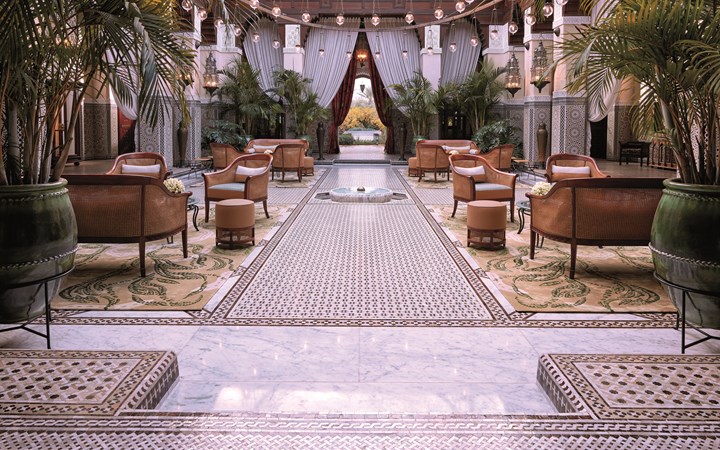 Luxury riad and palace hotel in Marrakech courtyard with fountain